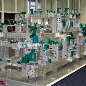 Outer meisterbock in Alufix Classic in a combination of system sizes, large for the frame, smaller (and therefore more flexible) for positioning adapters. Special components are anodized green, everything else is reusable.